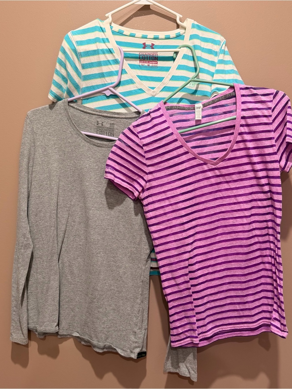 3 Women Under Armour shirts medium
